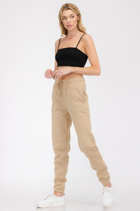 Boyfriend SWEATPANTS LOUNGEWEAR JOGGER BOTTOMSLeanne Roberts DesignsBoyfriend SWEATPANTS LOUNGEWEAR JOGGER BOTTOMSThe Boyfriend SWEATPANTS LOUNGEWEAR JOGGER BOTTOMS are made of 100% polyester and feature an elastic waistband with a drawstring for a comfortable fit. They also hav