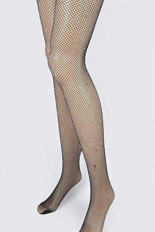 Rhinestone Accent Fishnet StockingLeanne Roberts DesignsRhinestone Accent Fishnet StockingCrafted from a luxurious blend of nylon, this striking fishnet stocking features a rhinestone accent, adding a touch of sophistication and allure. Its versatile one 