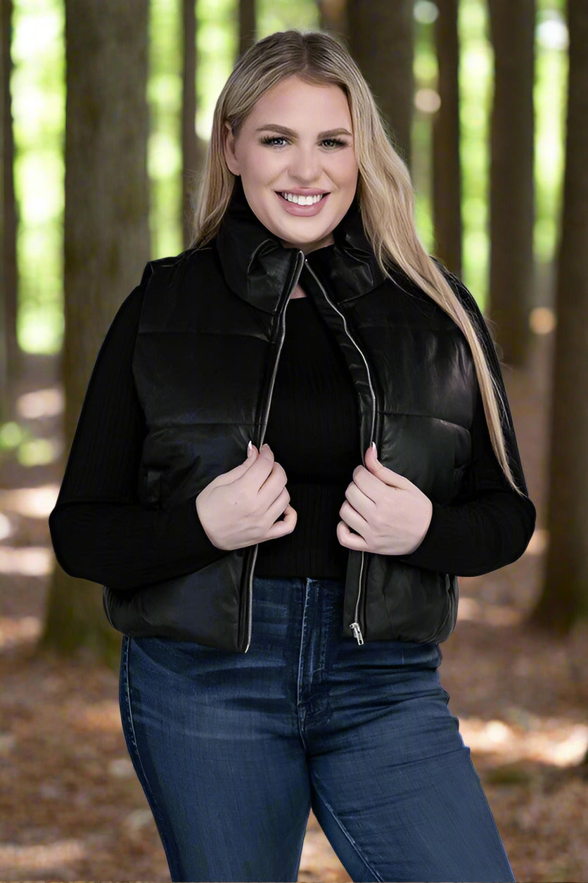 Puff VestLeanne Roberts DesignsPlus Puff VestElevate your cold-weather wardrobe with our Plus Puff Vest, featuring a convenient zipper and pockets. This vest is designed to keep you cozy and stylish during chil