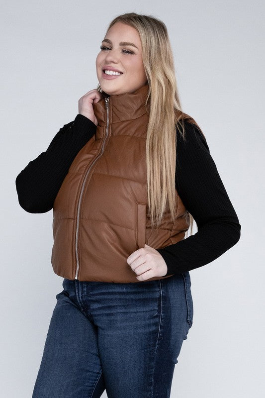 Puff VestLeanne Roberts DesignsPlus Puff VestElevate your cold-weather wardrobe with our Plus Puff Vest, featuring a convenient zipper and pockets. This vest is designed to keep you cozy and stylish during chil