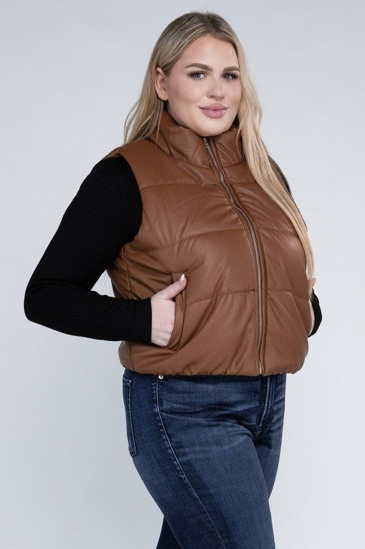 Puff VestLeanne Roberts DesignsPlus Puff VestElevate your cold-weather wardrobe with our Plus Puff Vest, featuring a convenient zipper and pockets. This vest is designed to keep you cozy and stylish during chil